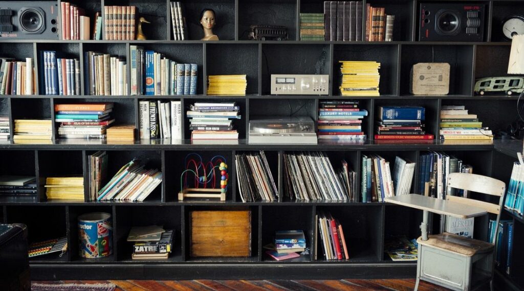 Bookself in home office filled with books